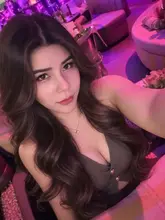Mimi, Indy Massage Bangkok outcall massage therapist, at a cafe