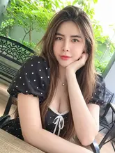 Mimi, Indy Massage Bangkok outcall massage therapist, at a cafe, photo 8
