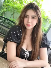 Mimi, Indy Massage Bangkok outcall massage therapist, at a cafe, photo 20